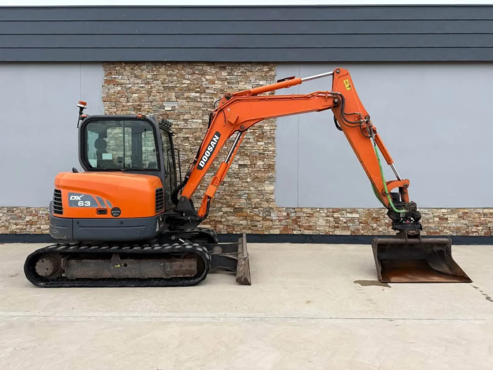 Stret Limited Doosan DX63 tracked excavator used on building work, extensions and site preparation in Staffordshire