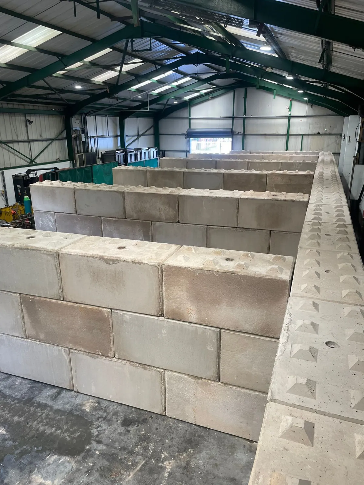 Interlocking concrete block storage bays built inside a commercial unit by Stret Limited