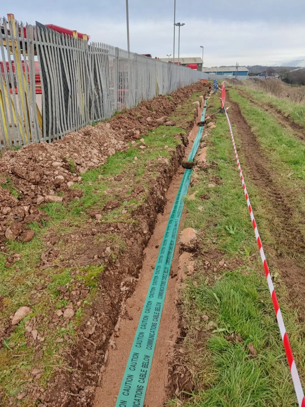 Long service trench with communications ducting installed on a commercial site