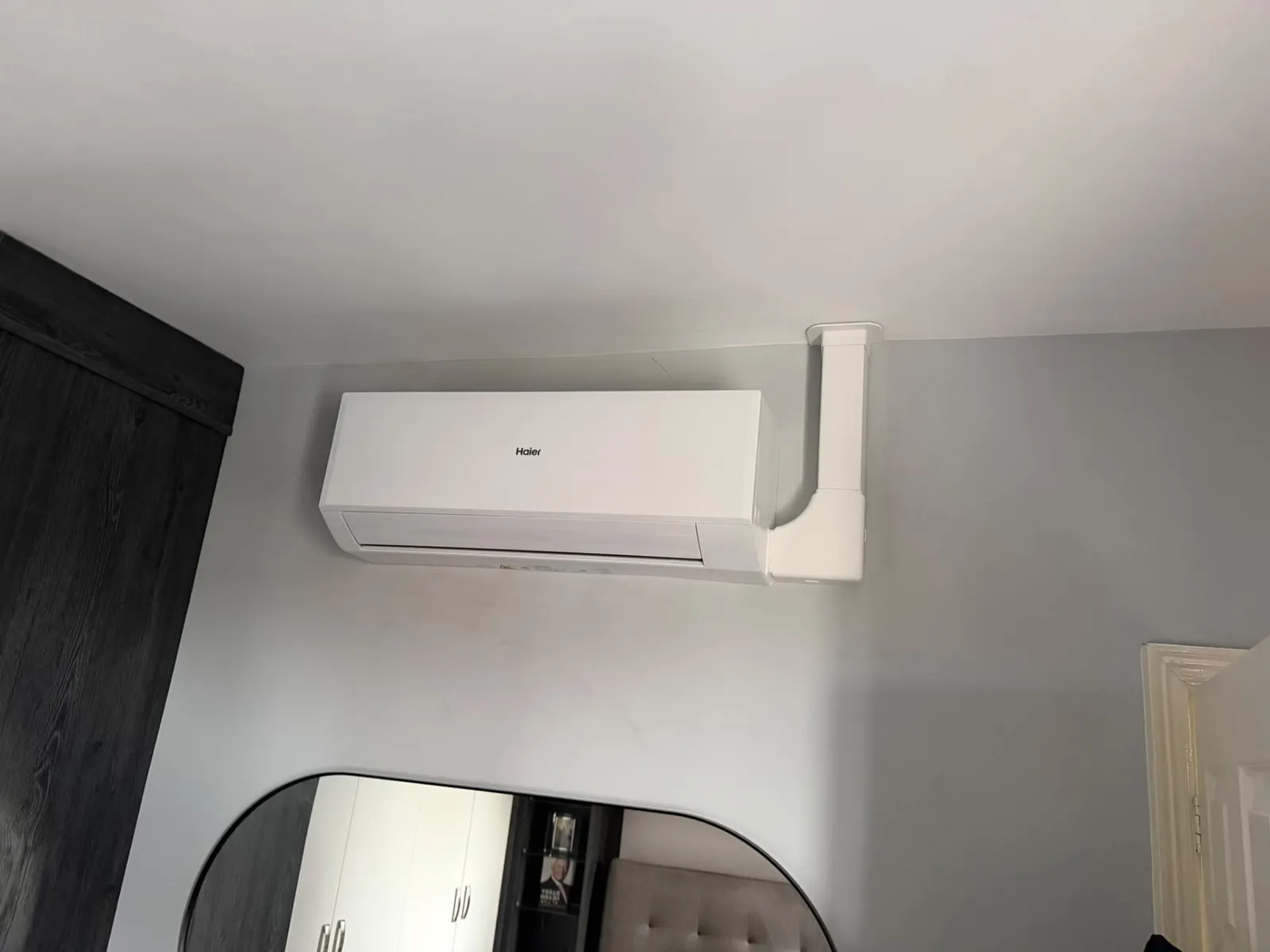 Wall-mounted air conditioning indoor unit installed in a room by F-Gas certified installers
